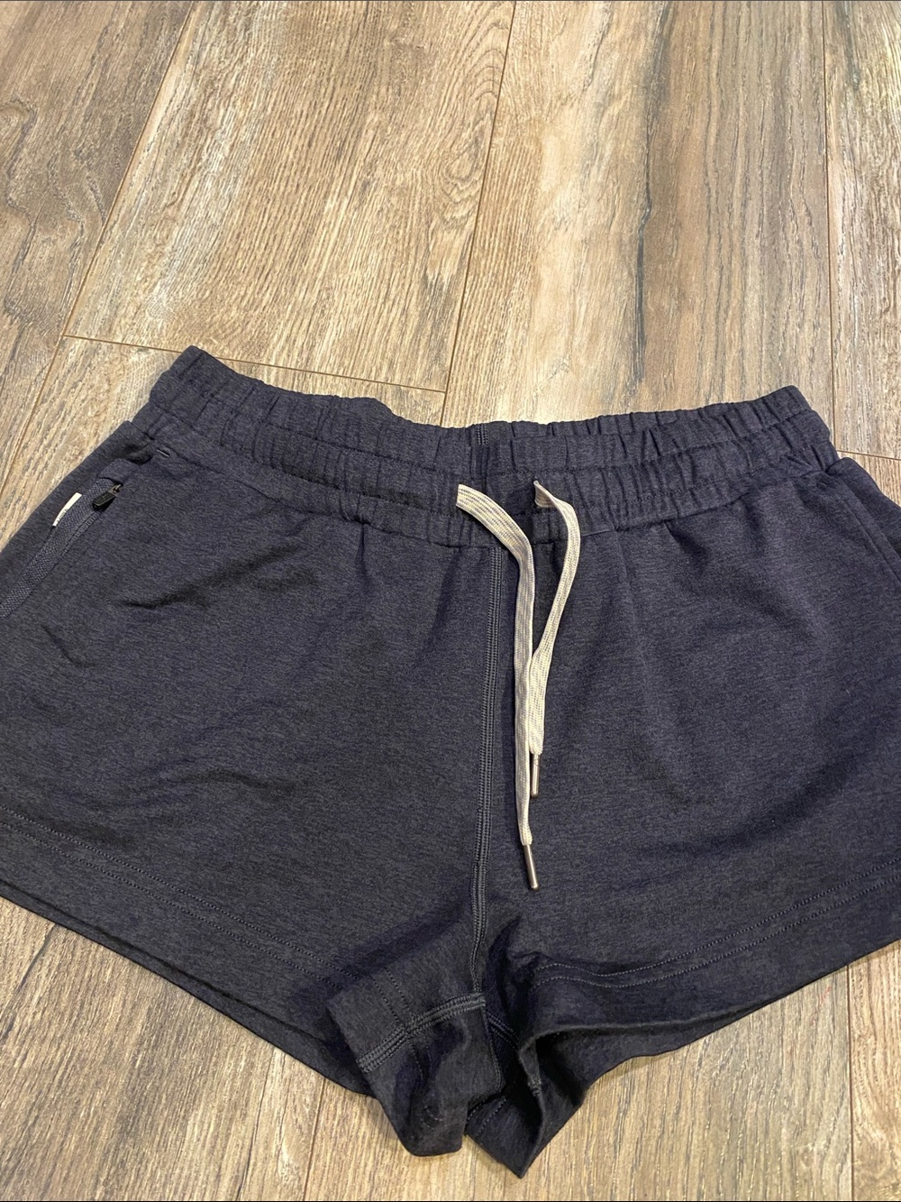 Vuori Women's Navy Athletic Shorts with Cream Drawstring